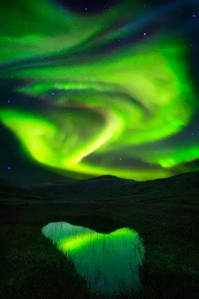 northern-lights-photography-tips-aurora-godess-of-dawn-east-fjords-iceland-copy