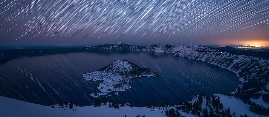 star trails over crater lake in southern oregon