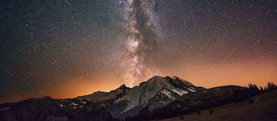 the Milky Way galaxy photographed over mount rainier in washington state during Dave Morrows Night Sky and star photography workshops